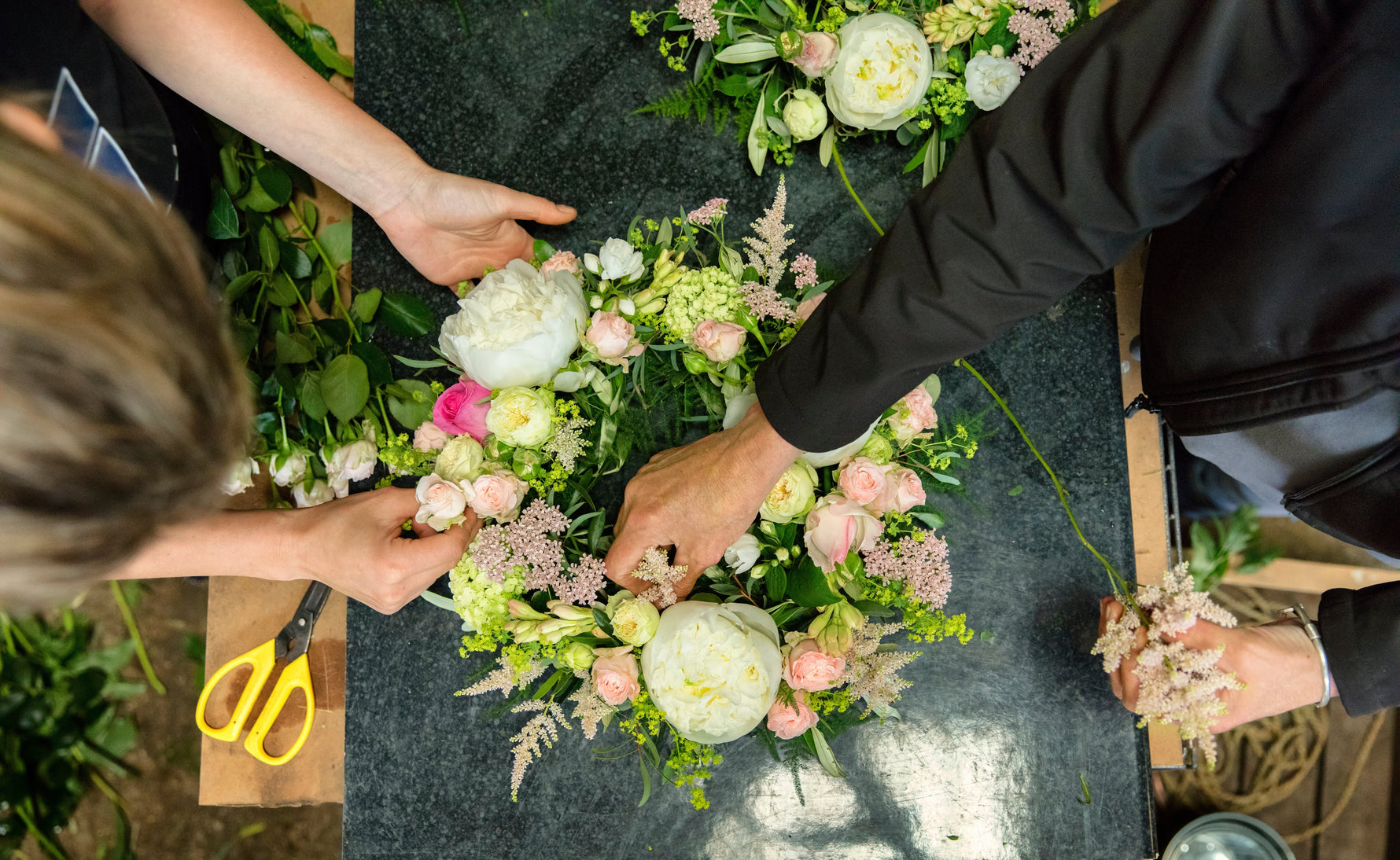 Etiquette 101: The Difference Between Sympathy and Funeral Flowers (& What to Write)