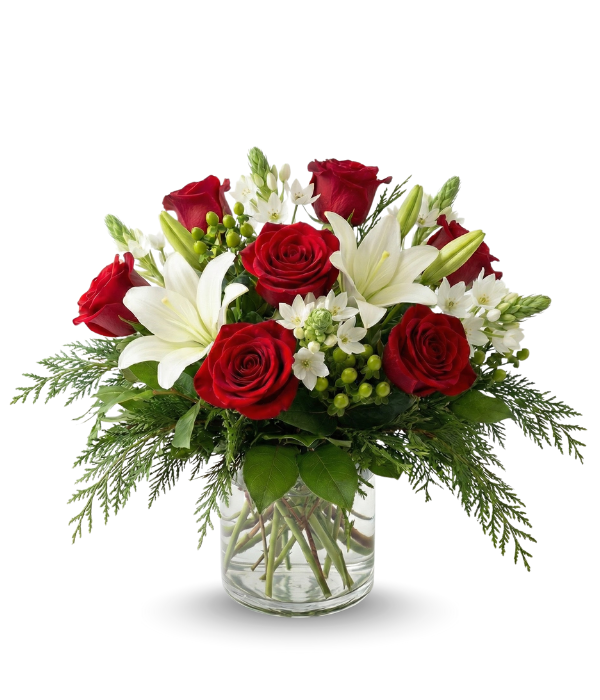 Bouquet of red roses and white lilies in a clear vase on a white background